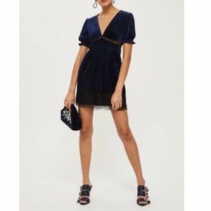 Navy velvet mini dress with lace insets